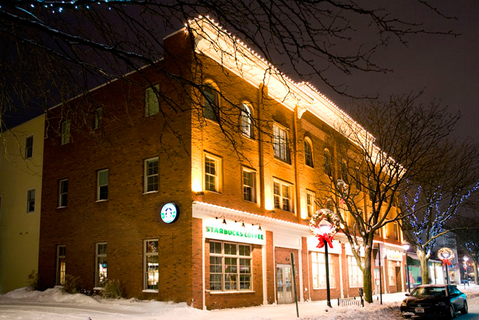 Commercial building with lights at night
